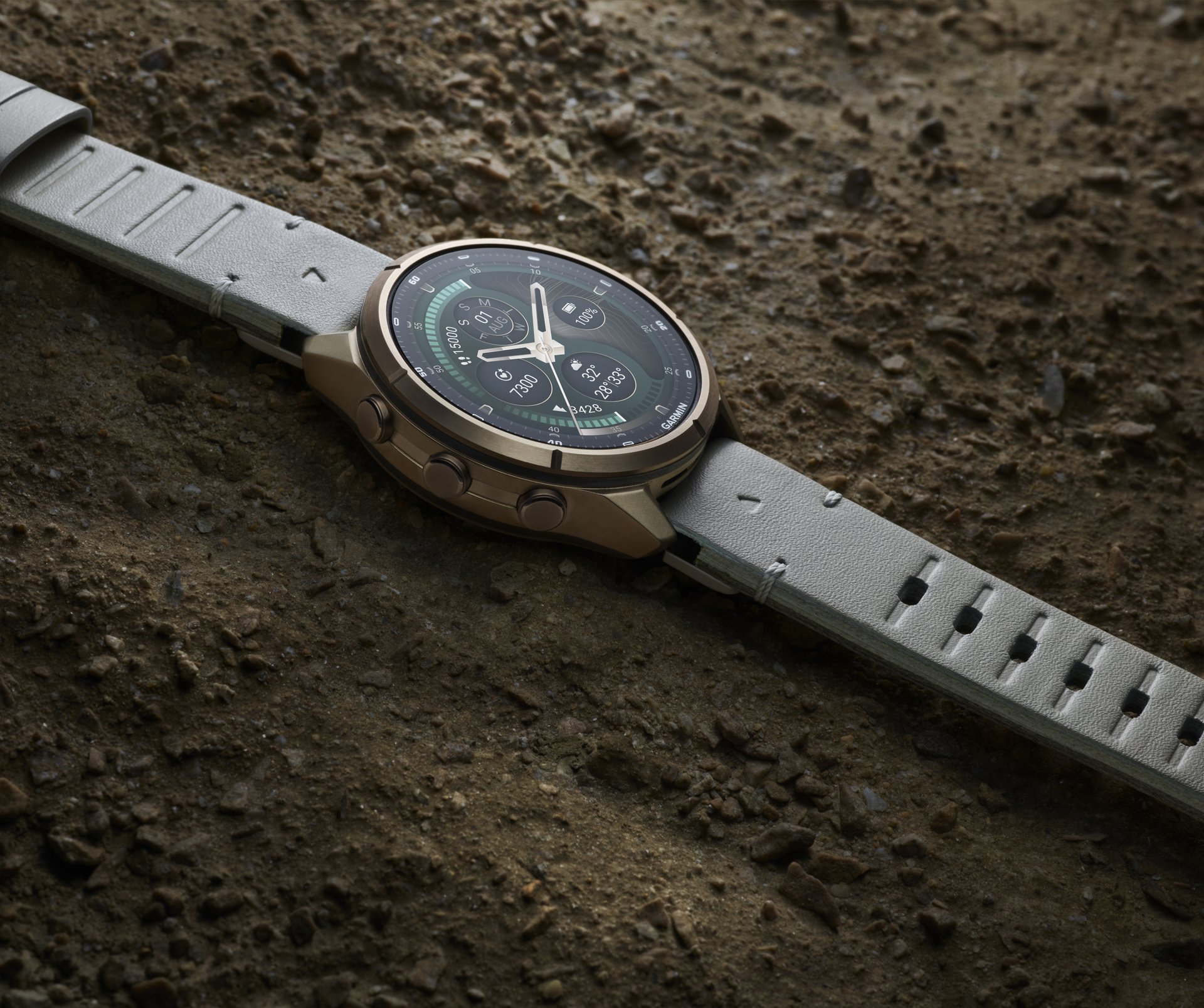 Garmin fēnix® 9 Pro inReach® - 43 mm AMOLED Sapphire Autumn Gold Titanium with Bone Leather Band + Cream/French Gray Silicone Band 010-04335-41