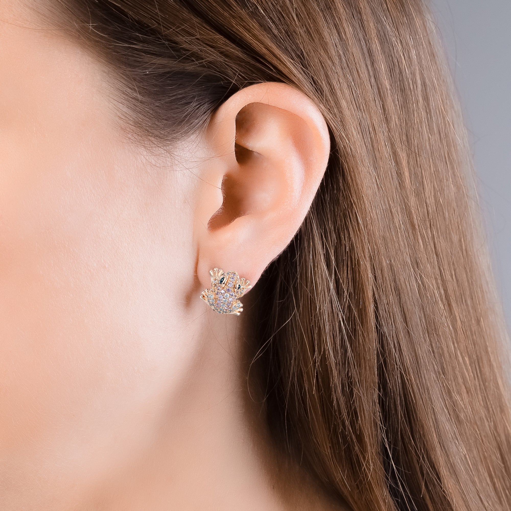 At the time, Louisa frog stud earrings, rose gold plated, with white and delicate pink cubic zirconia