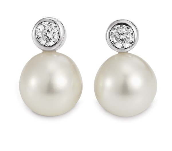 Adriana pearl earrings with white zirconia stone S1
