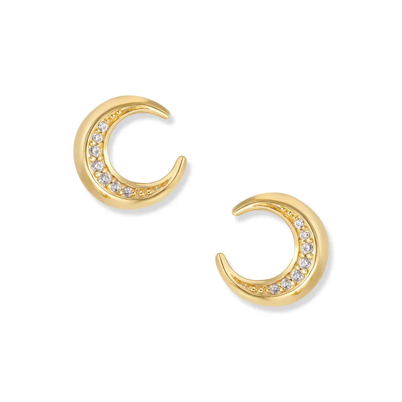 At the time, Muna Gold Moon stud earrings made of 925 sterling silver, 18K gold plated and with white cubic zirconia